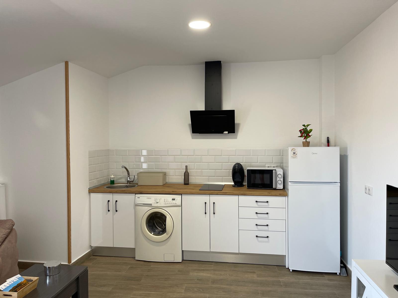 Cocina y salón del apartamento ORIGEN